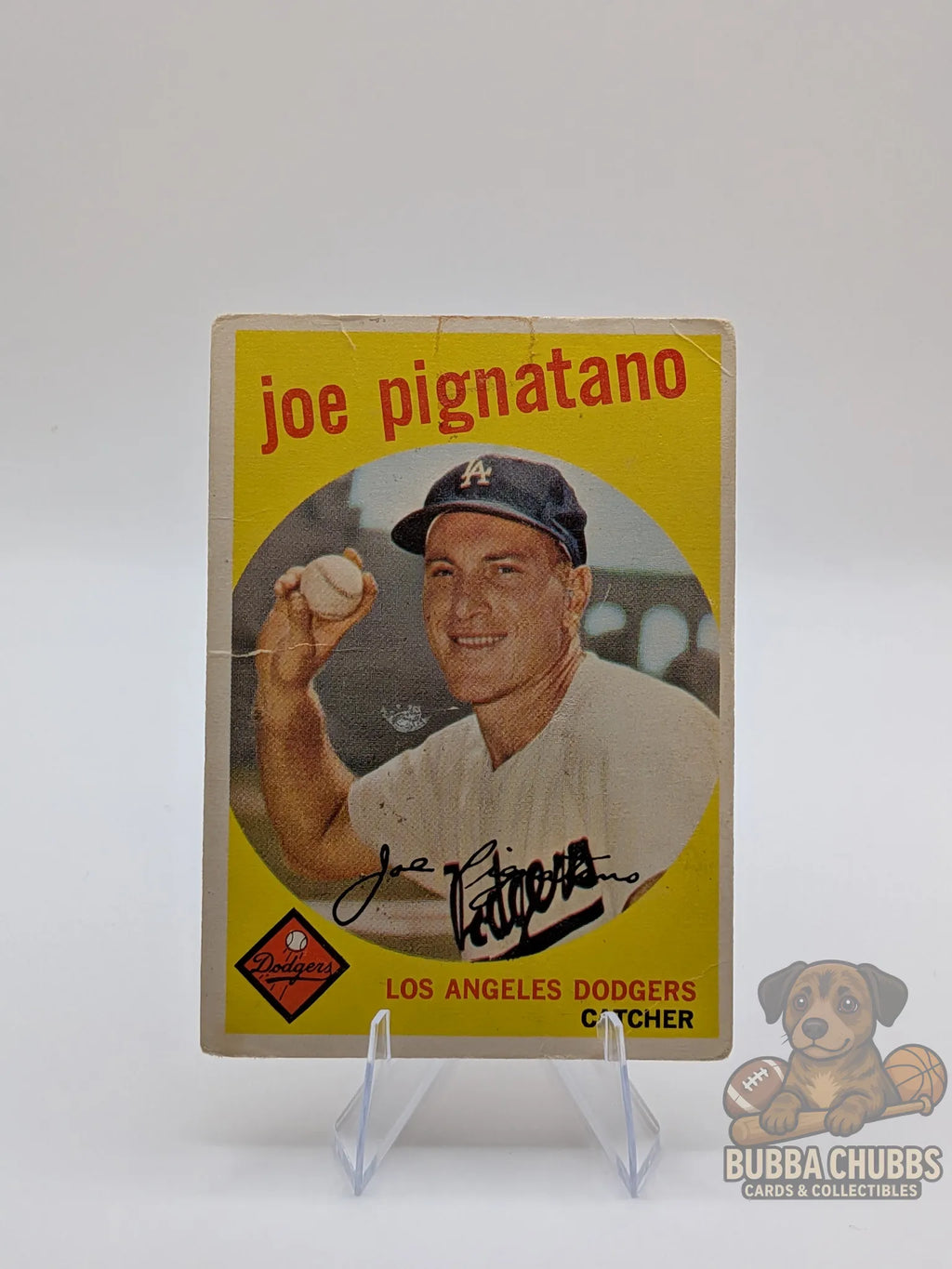 Vintage baseball trading card of Joe Pignatano of the Los Angeles Dodgers topps chewing gum case
