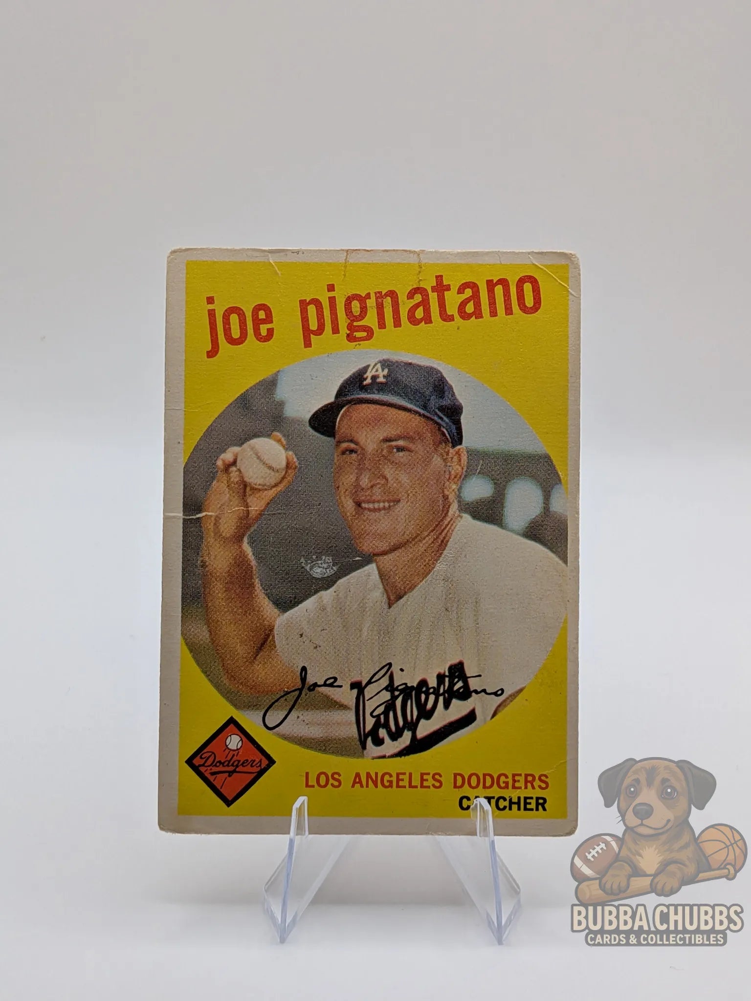 Vintage baseball trading card of Joe Pignatano of the Los Angeles Dodgers topps chewing gum case