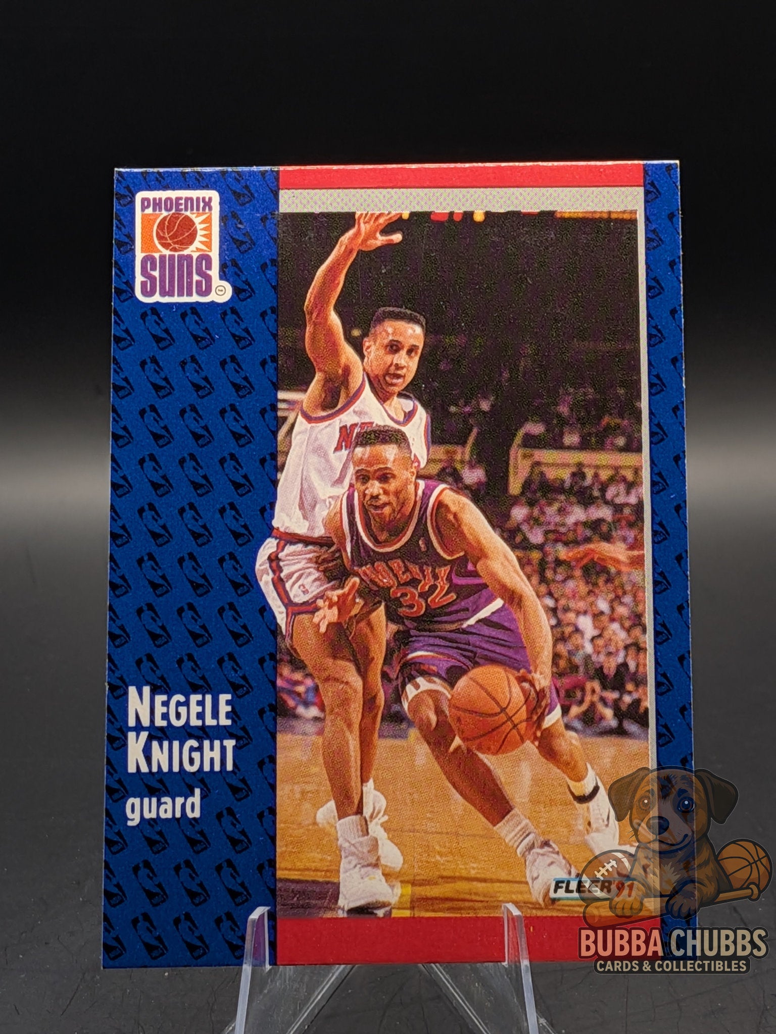 Basketball trading card of Negele Knight with Phoenix Suns  fleer early modern 90's era
