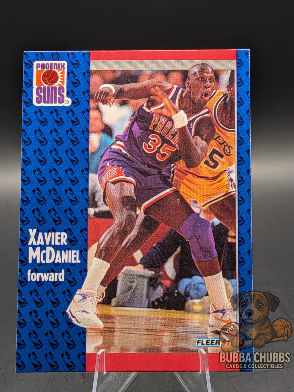 Basketball trading card of Xavier McDaniel of the Phoenix Suns fleer base 90's era