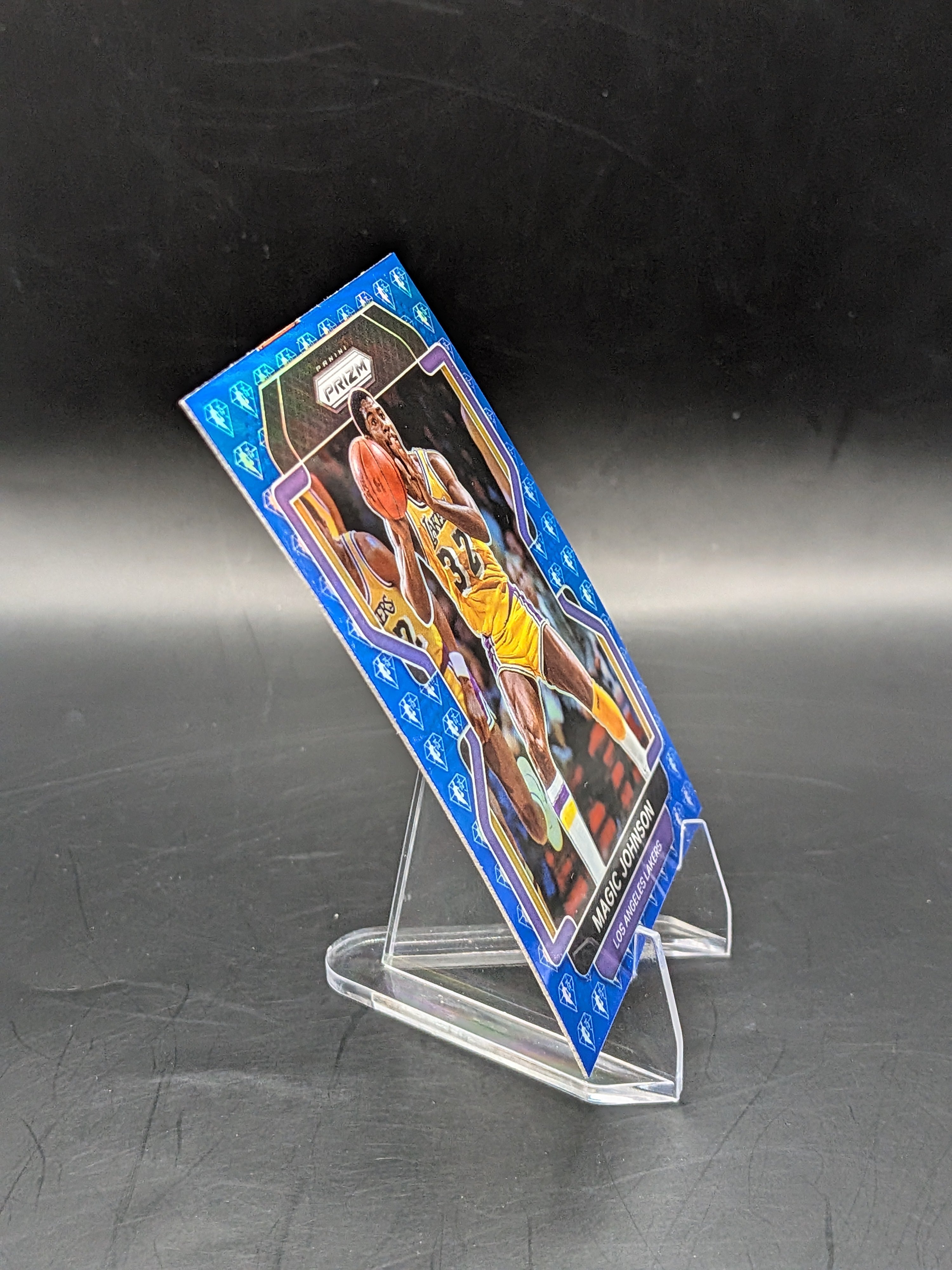 Basketball trading card of Magic Johnson LA Lakers panini prizm hall of fame 75th anniversary blue diamond parallel