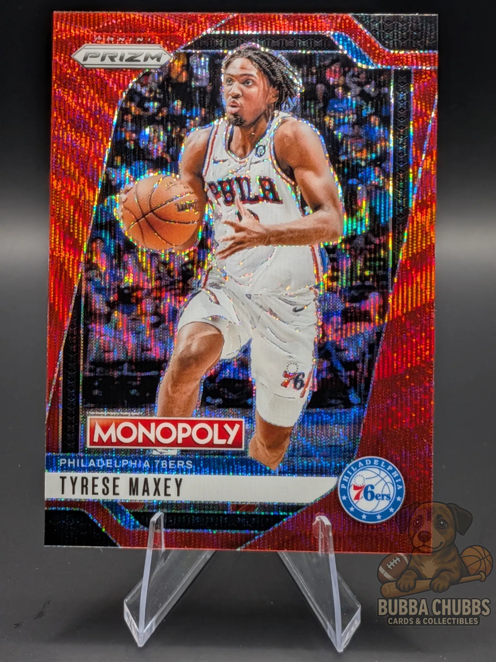 Basketball trading card of Tyrese Maxey of the Philadelphia 76ers. panini prizm monopoly red parallel