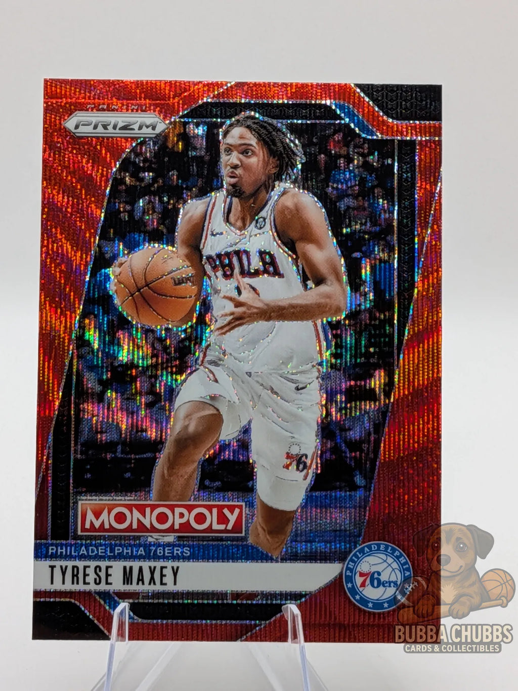 Basketball trading card of Tyrese Maxey of the Philadelphia 76ers. panini prizm monopoly red parallel