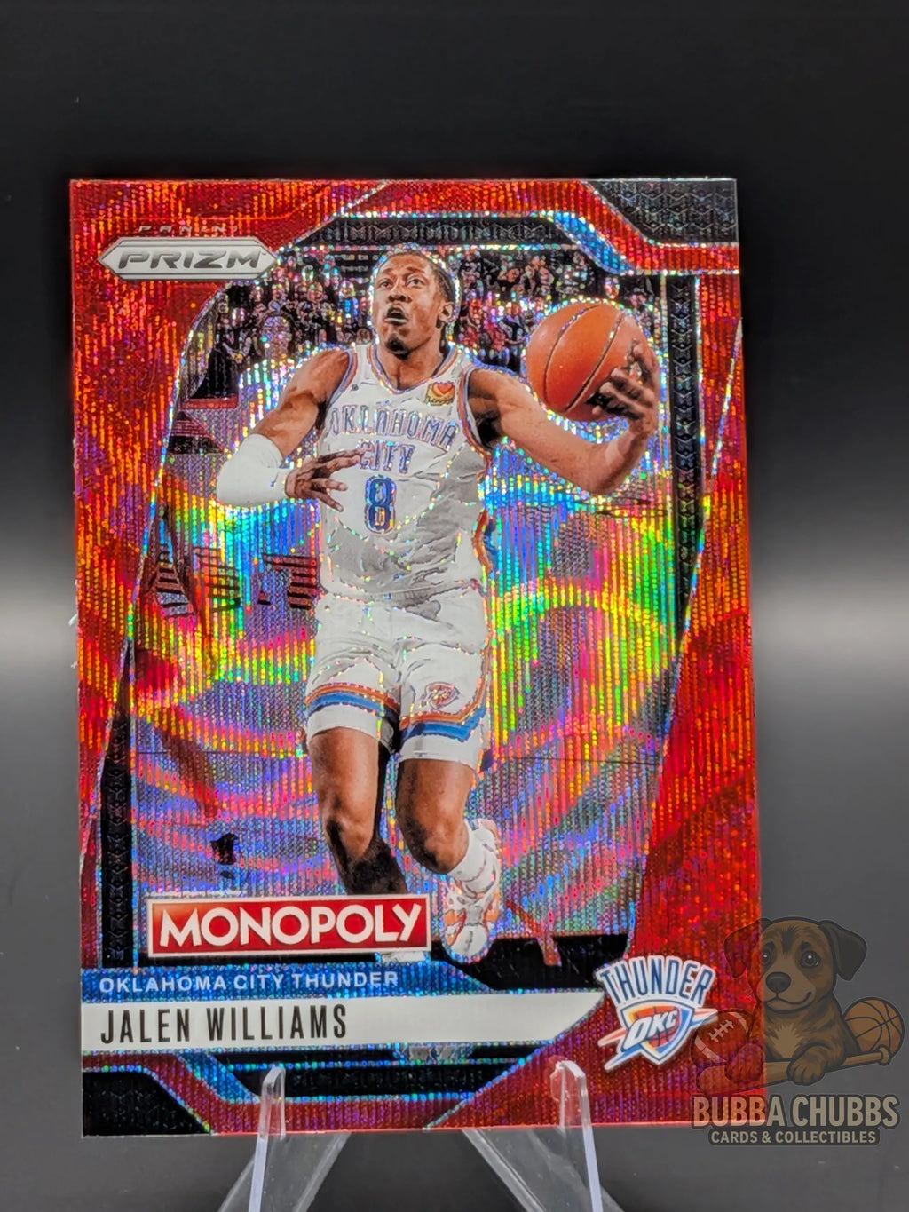 Basketball trading card featuring Jalen Williams of the Oklahoma City Thunder panini prizm monopoly red shimmer parallel