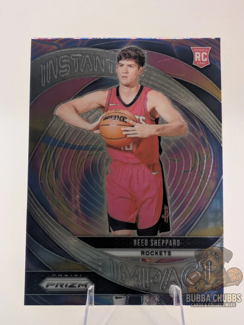 Basketball rookie trading card featuring Reed Sheppard of the Houston Rockets panini prizm instant impact