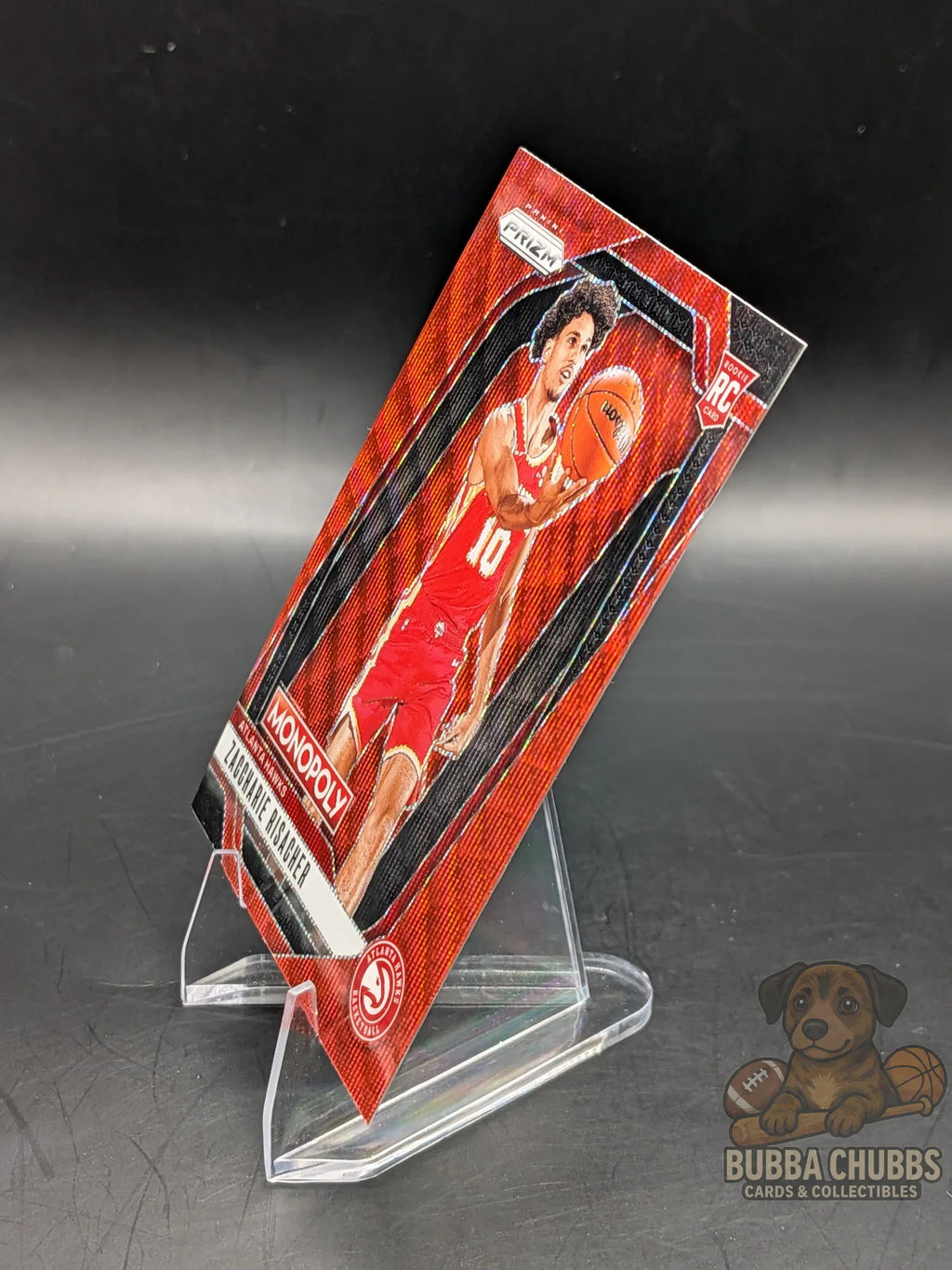 Basketball trading card of rookie zaccharie risacher of the Atlanta hawks panini prizm monopoly red shimmer parallel