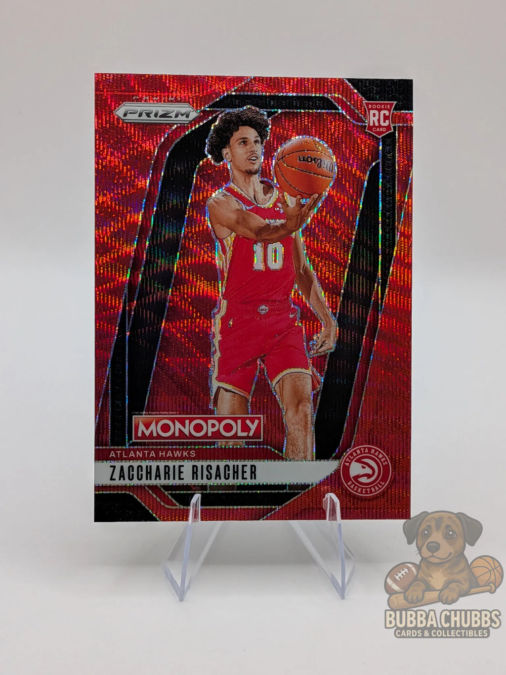 Basketball trading card of rookie zaccharie risacher of the Atlanta hawks panini prizm monopoly red shimmer parallel