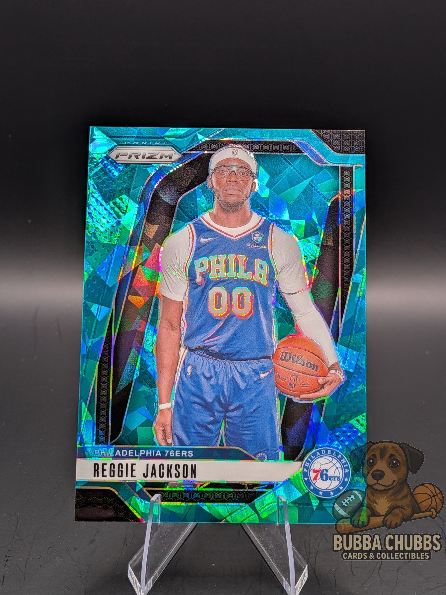 basketball trading card featuring reggie jackson panini prizm cracked ice teal parallel refractor