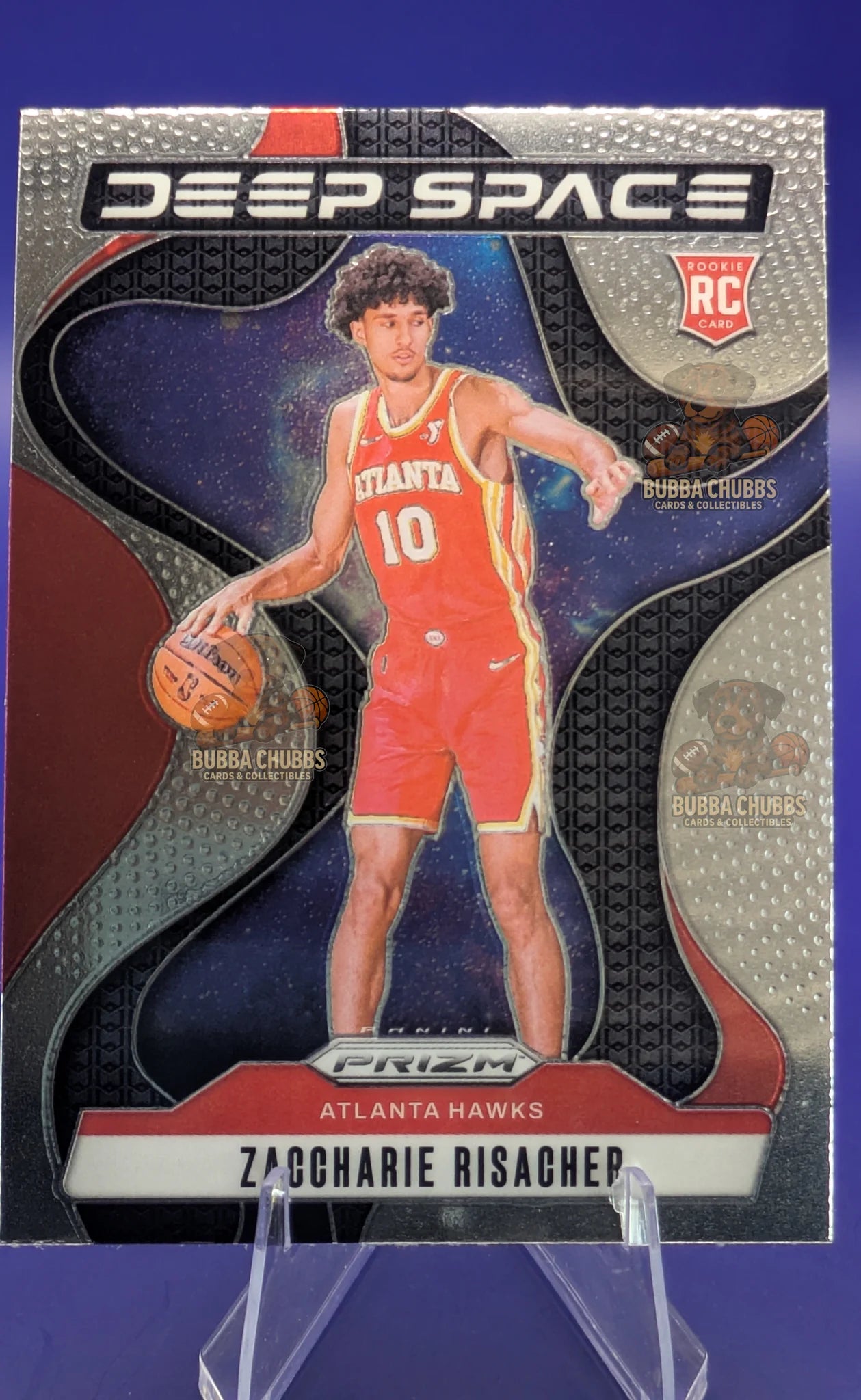 Basketball trading card of Zaccharie Risacher in an Atlanta Hawks jersey with 'Deep Space' branding.