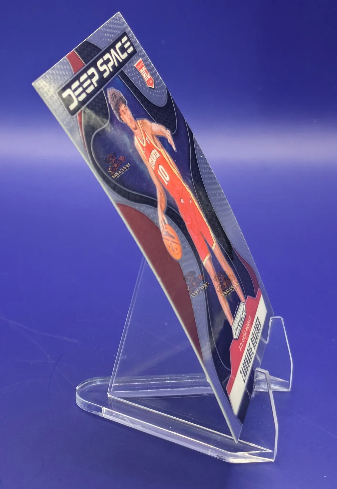 Basketball trading card of Zaccharie Risacher in an Atlanta Hawks jersey with 'Deep Space' branding.