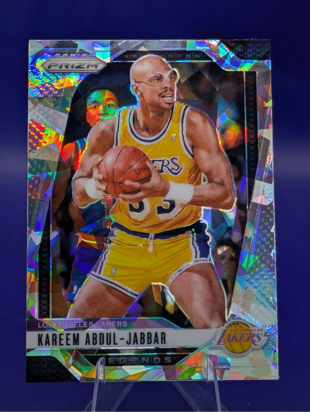 Basketball trading card of Kareem Abdul-Jabbar in a Los Angeles Lakers uniform Prizm Panini Legends