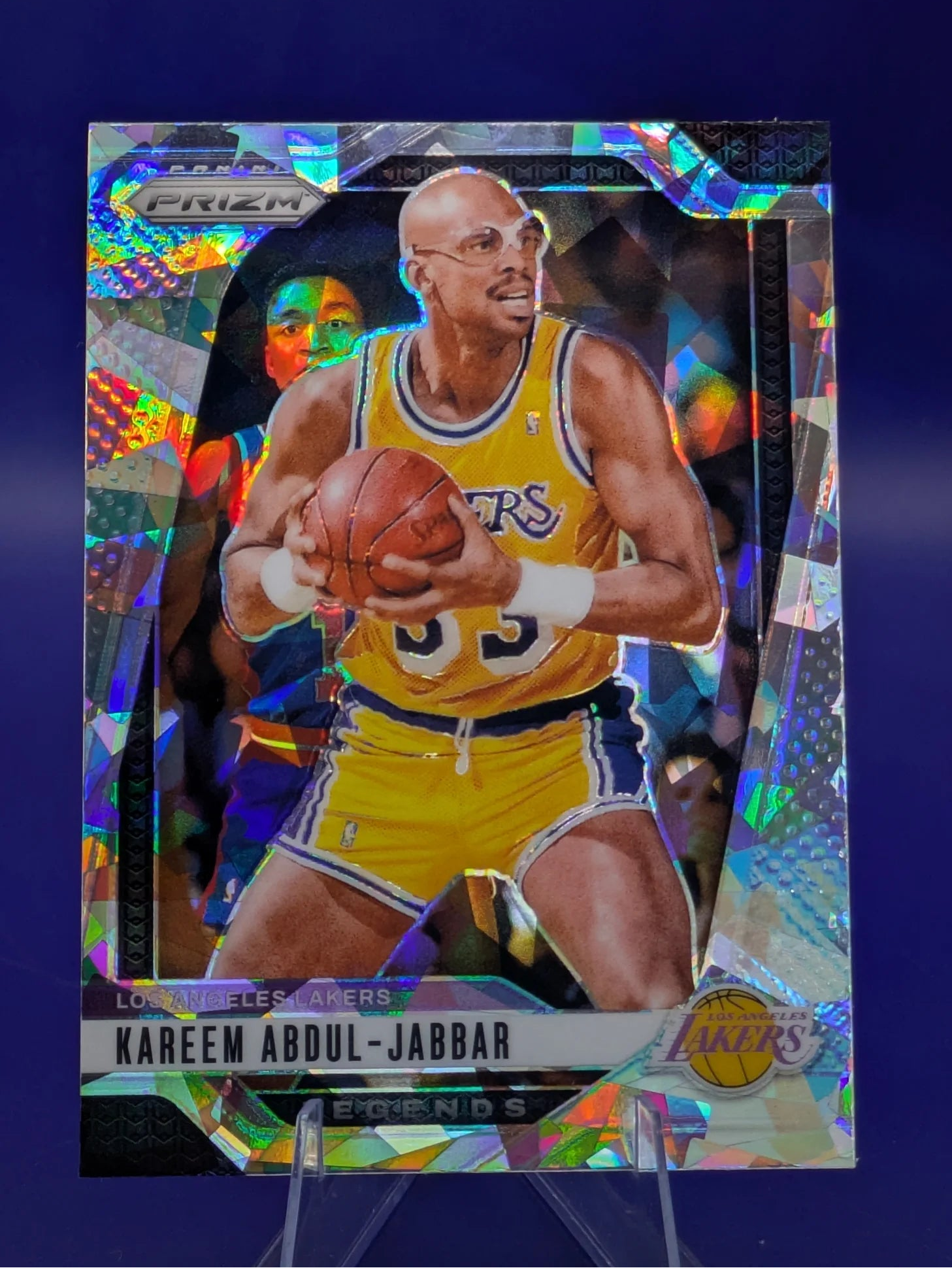 Basketball trading card of Kareem Abdul-Jabbar in a Los Angeles Lakers uniform Prizm Panini Legends