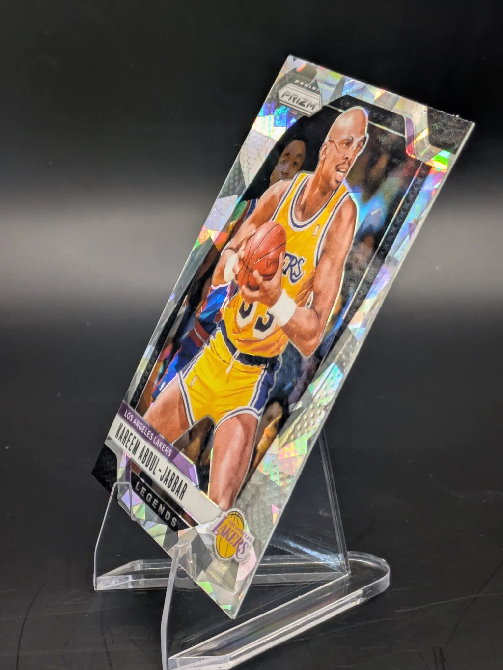 Basketball trading card of Kareem Abdul-Jabbar in a Los Angeles Lakers uniform Prizm Panini Legends
