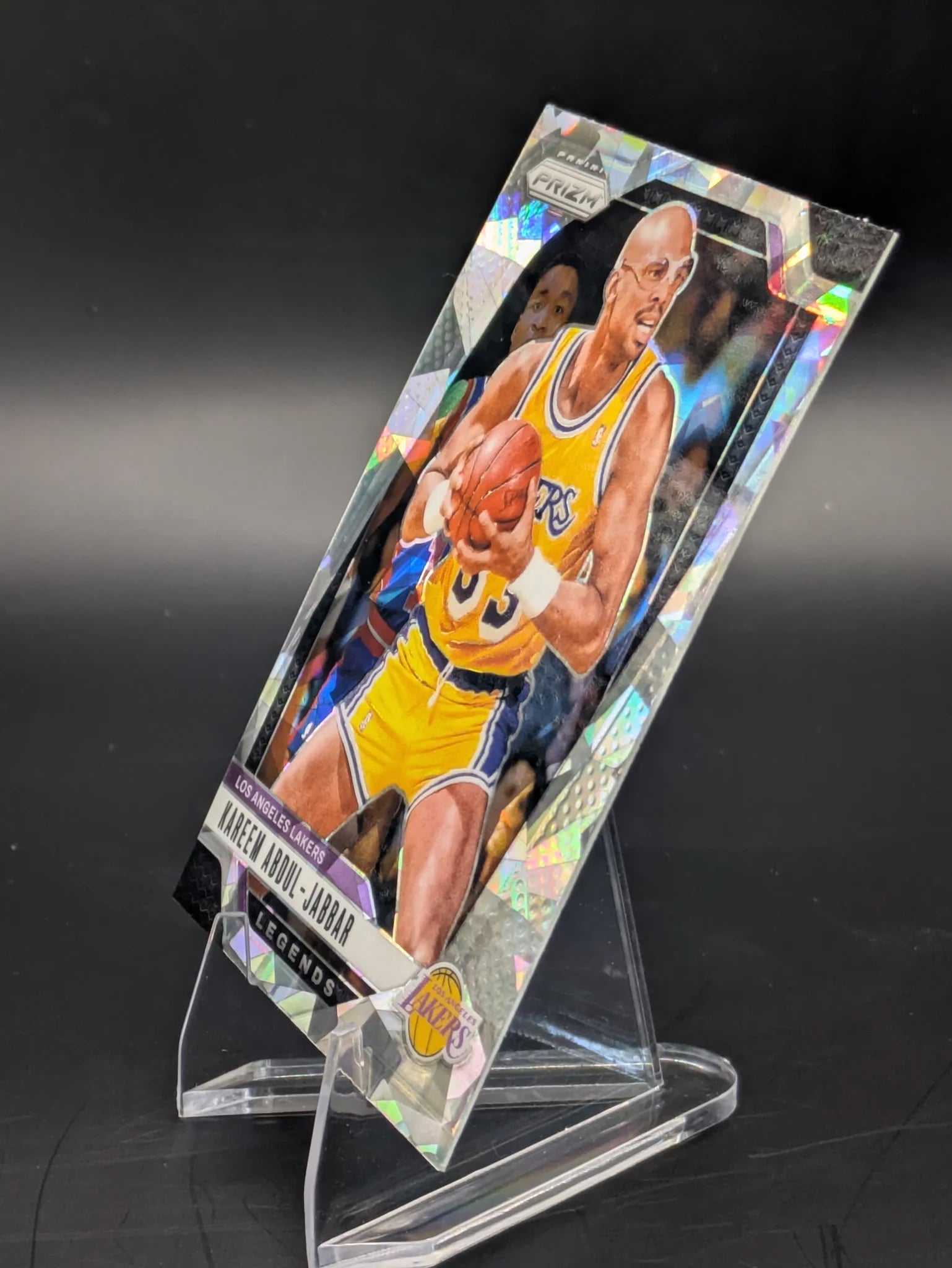 Basketball trading card of Kareem Abdul-Jabbar in a Los Angeles Lakers uniform Prizm Panini Legends