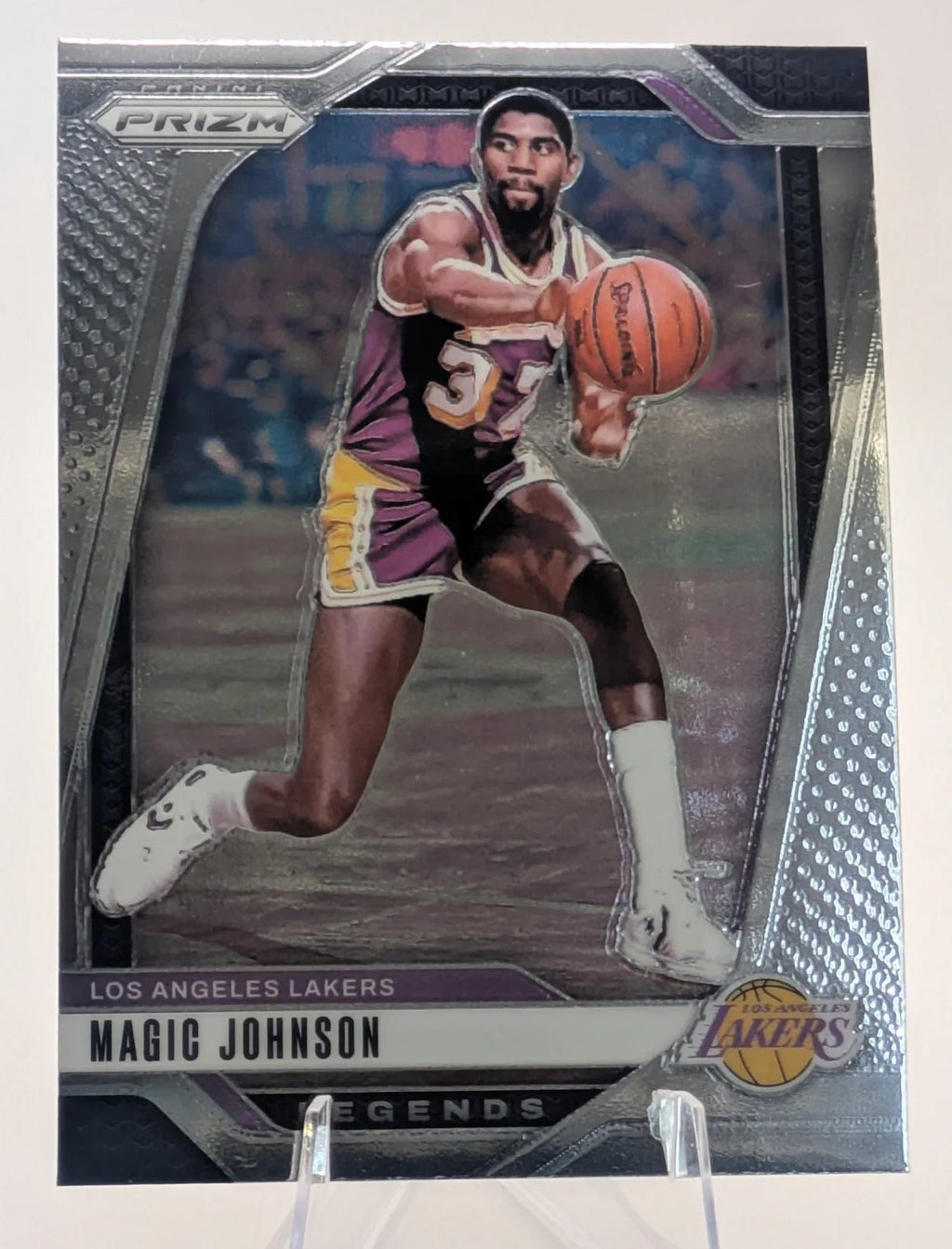 Basketball trading card of Magic Johnson in a Los Angeles Lakers uniform Prizm Panini Legends