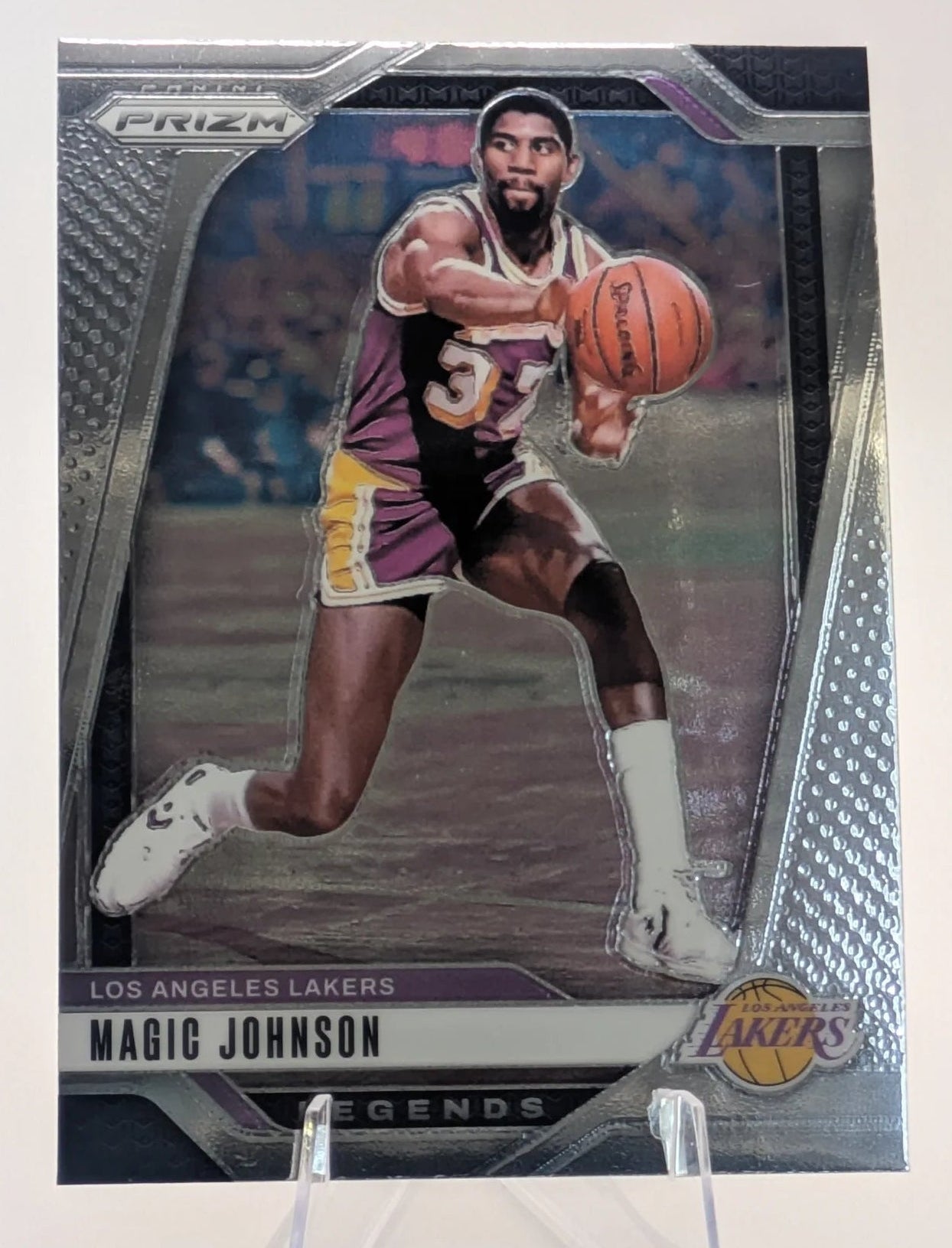 Basketball trading card of Magic Johnson in a Los Angeles Lakers uniform Prizm Panini Legends