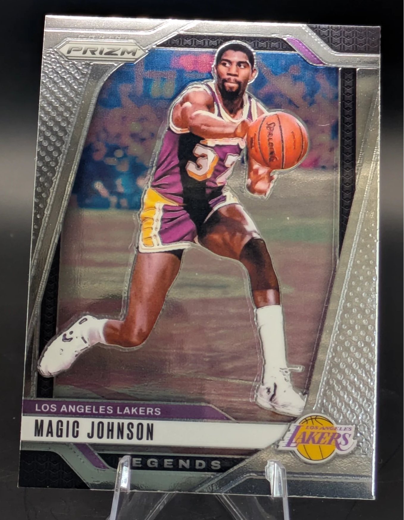Basketball trading card of Magic Johnson in a Los Angeles Lakers uniform Prizm Panini Legends