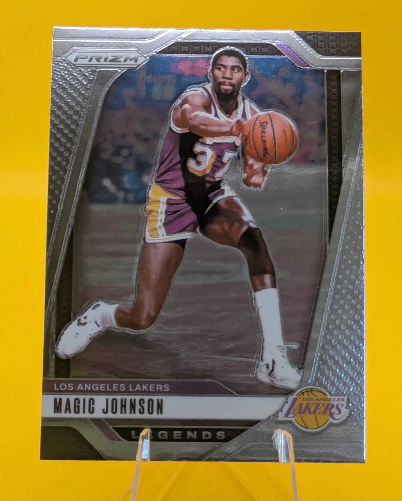 Basketball trading card of Magic Johnson in a Los Angeles Lakers uniform Prizm Panini Legends