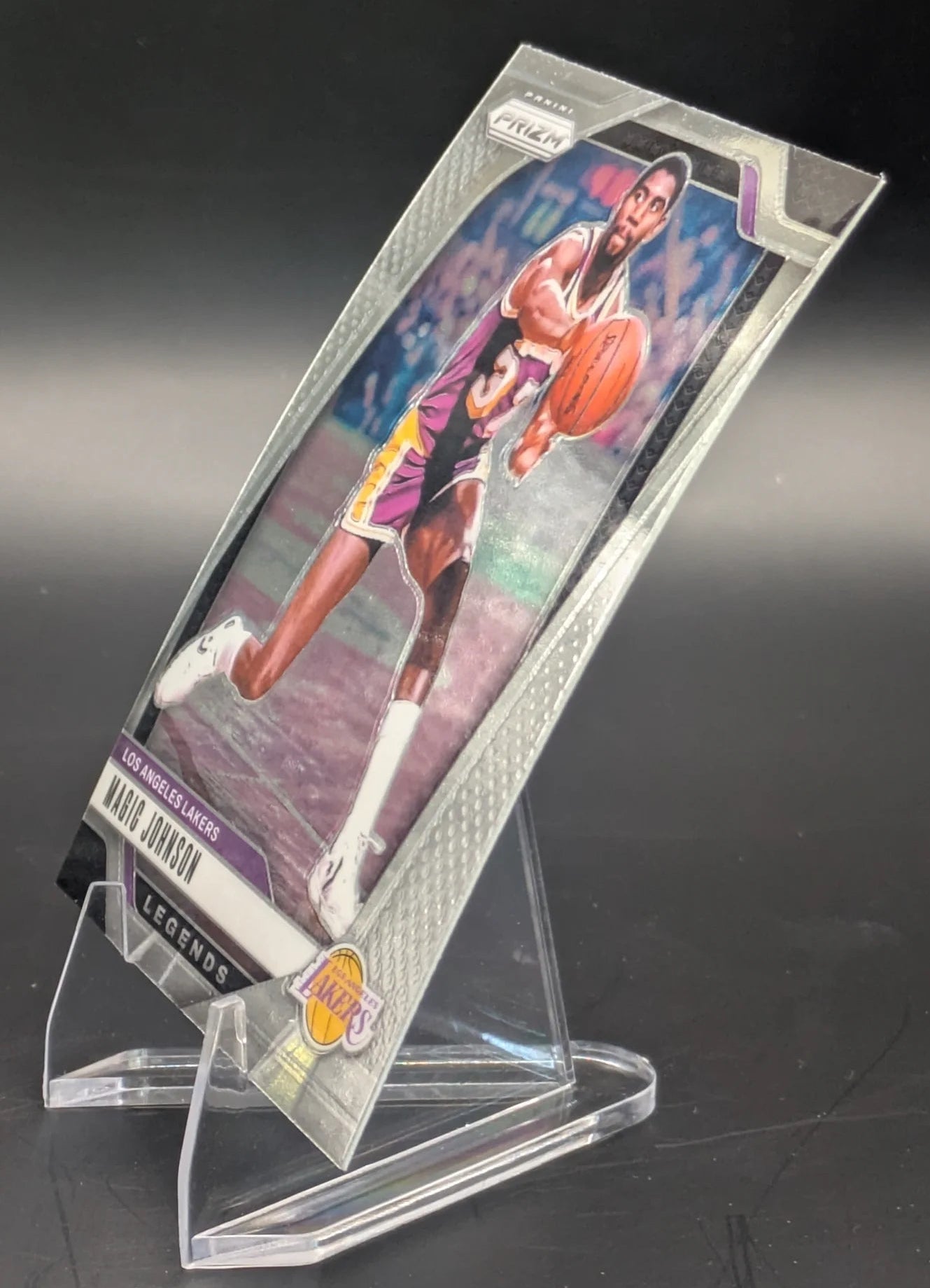 Basketball trading card of Magic Johnson in a Los Angeles Lakers uniform Prizm Panini Legends
