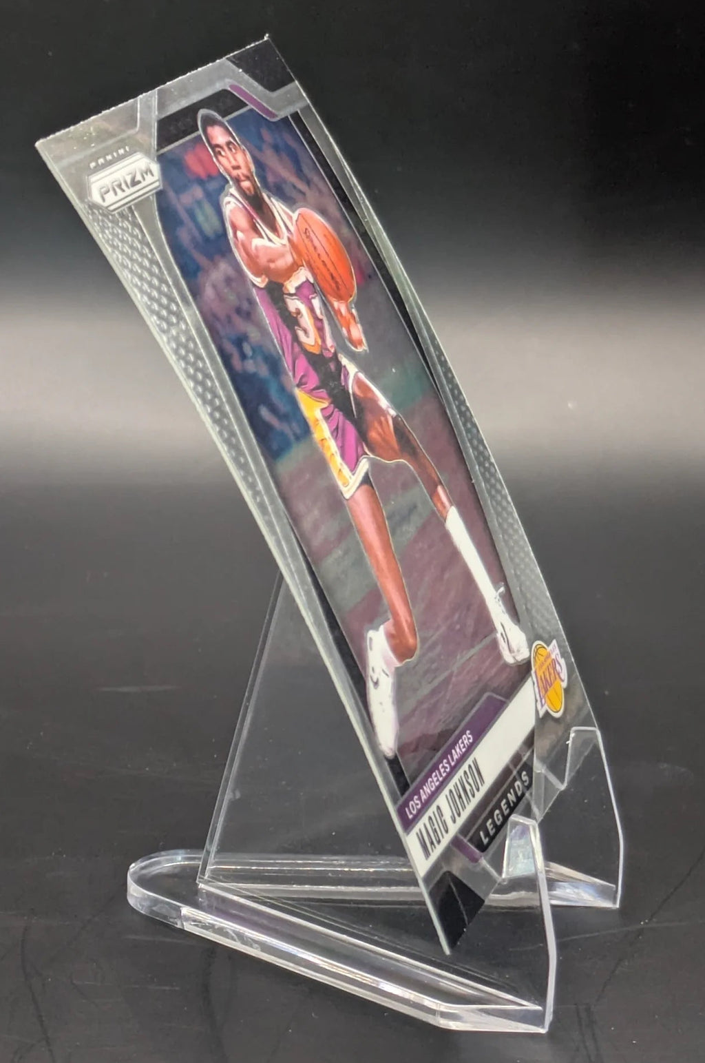 Basketball trading card of Magic Johnson in a Los Angeles Lakers uniform Prizm Panini Legends