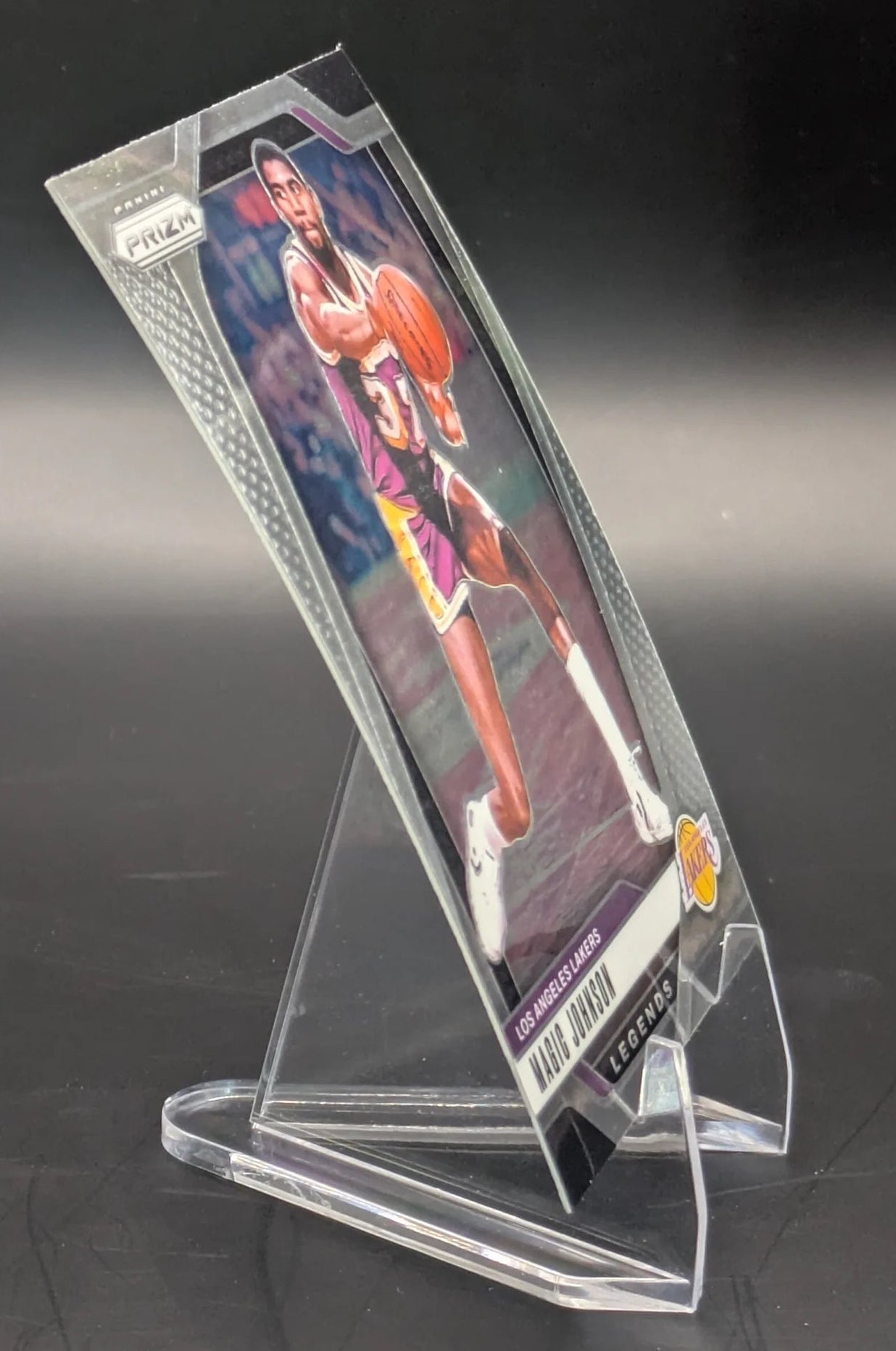 Basketball trading card of Magic Johnson in a Los Angeles Lakers uniform Prizm Panini Legends