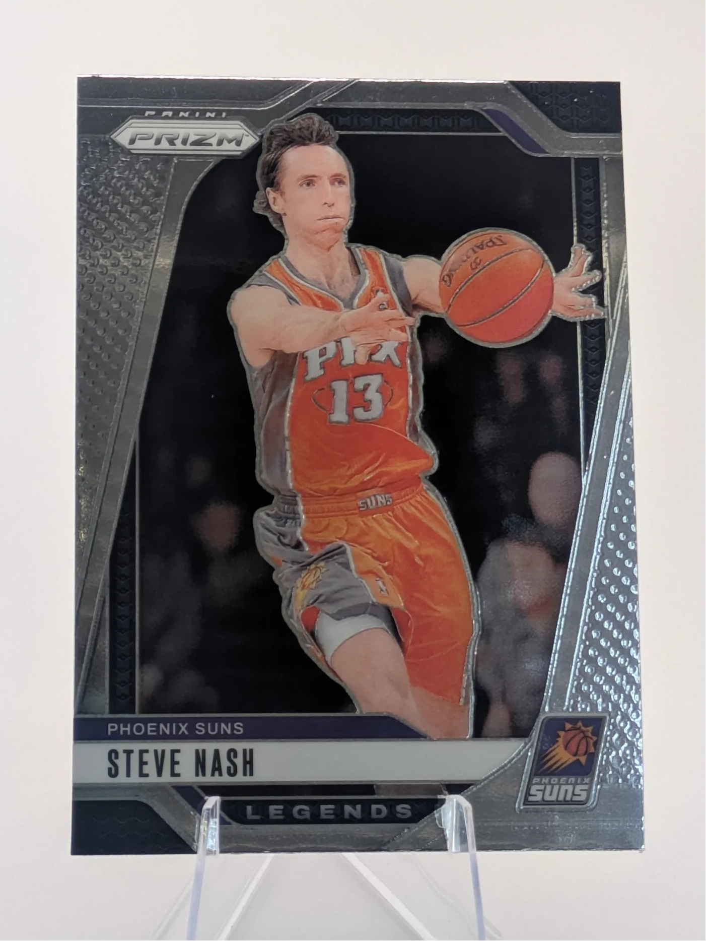 Basketball trading card of Steve Nash in a Phoenix Suns uniform Prizm Panini Legends