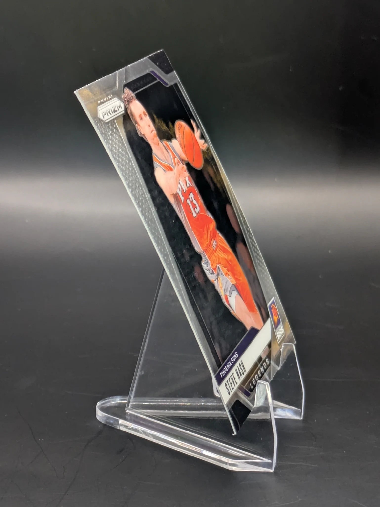 Basketball trading card of Steve Nash in a Phoenix Suns uniform Prizm Panini Legends