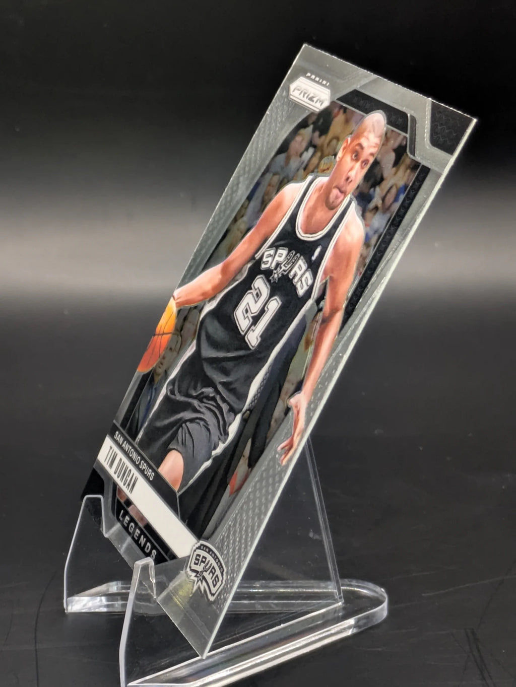 Basketball trading card of Tim Duncan in a San Antonio Spurs uniform Prizm Panini Legends