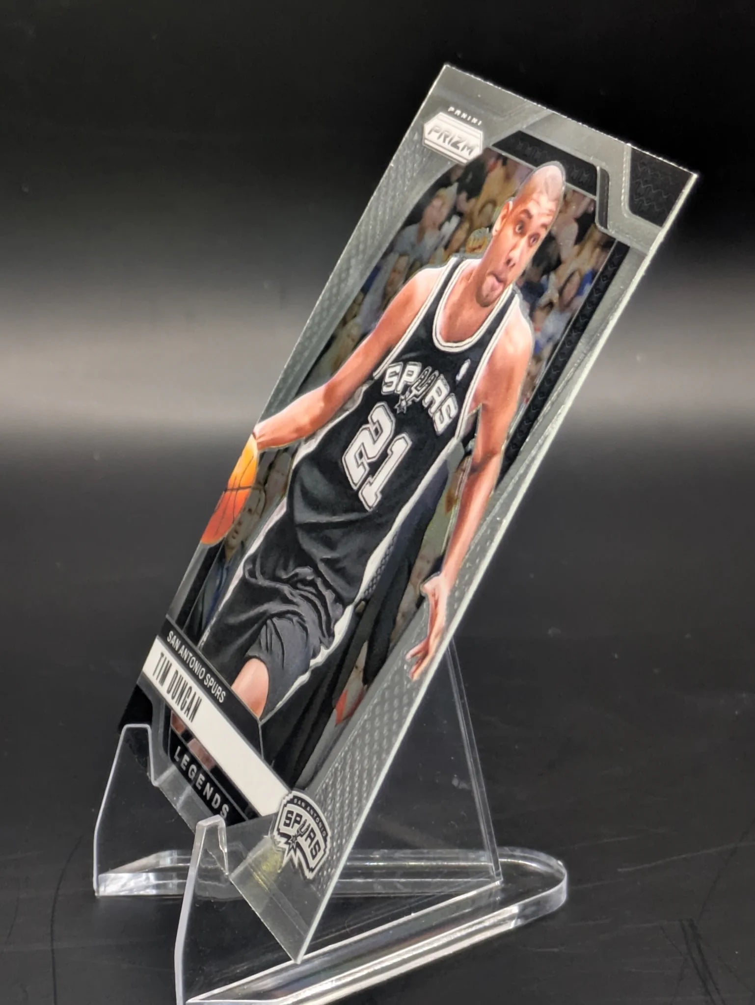 Basketball trading card of Tim Duncan in a San Antonio Spurs uniform Prizm Panini Legends