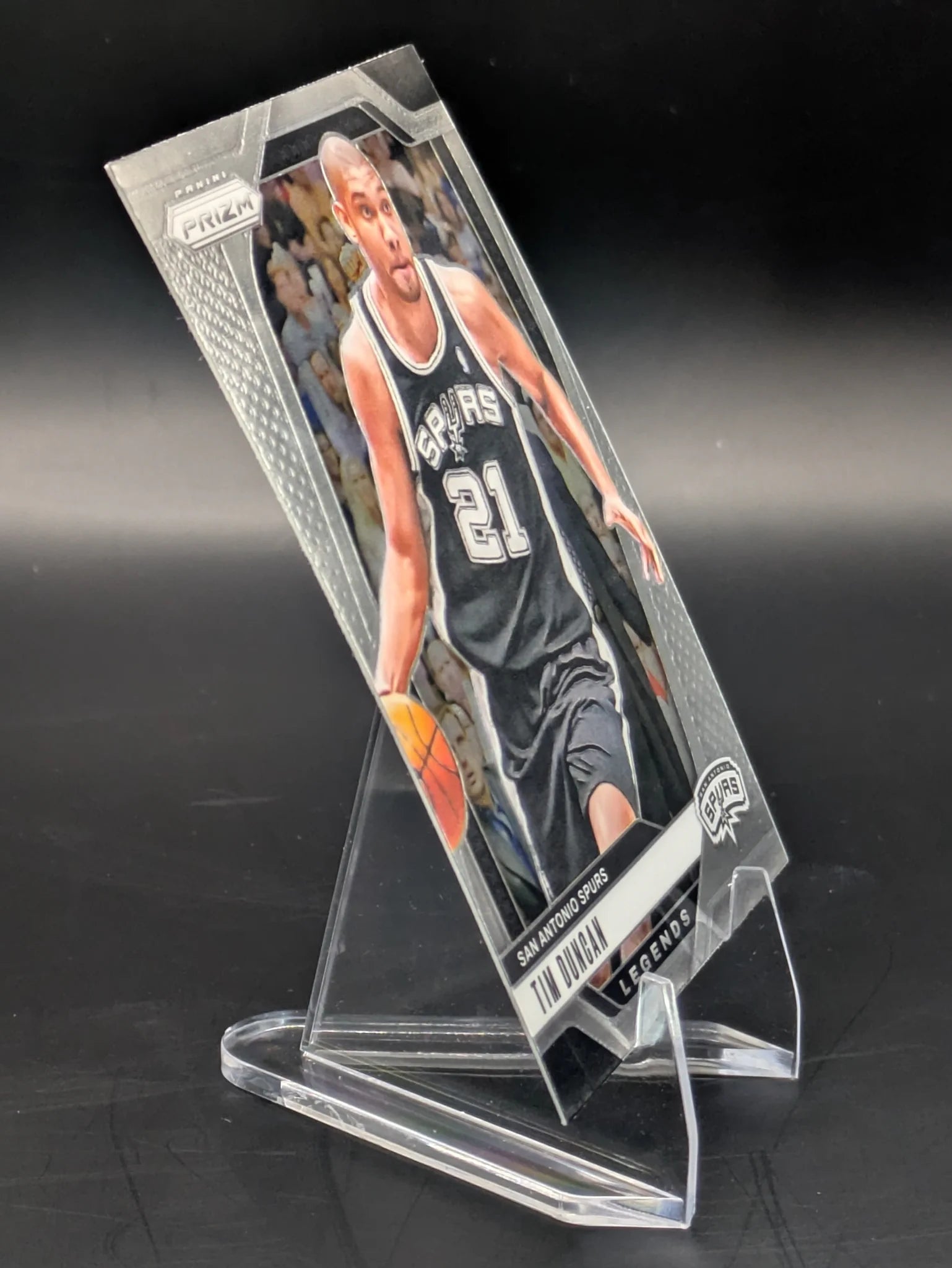 Basketball trading card of Tim Duncan in a San Antonio Spurs uniform Prizm Panini Legends