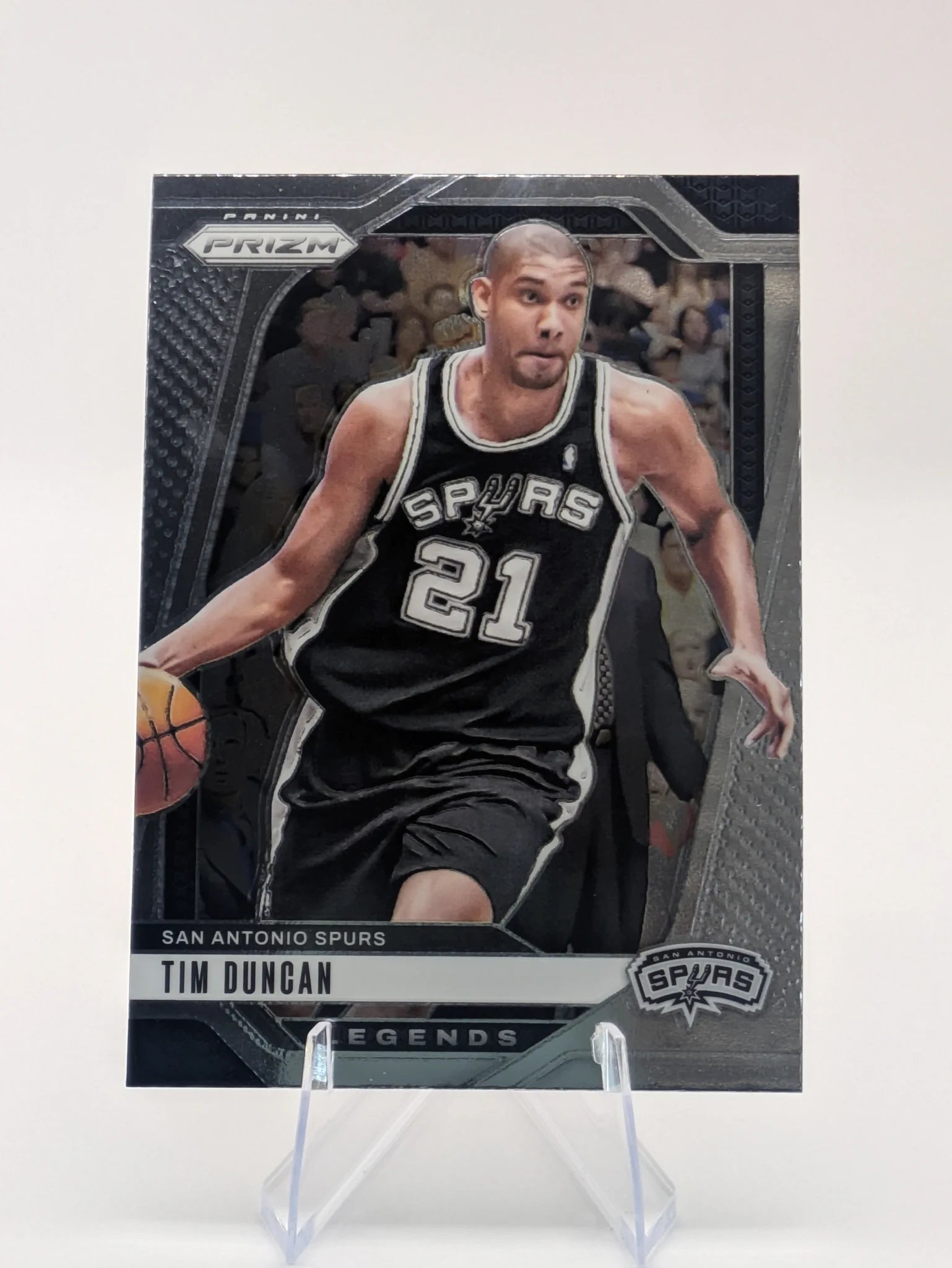 Basketball trading card of Tim Duncan in a San Antonio Spurs uniform Prizm Panini Legends