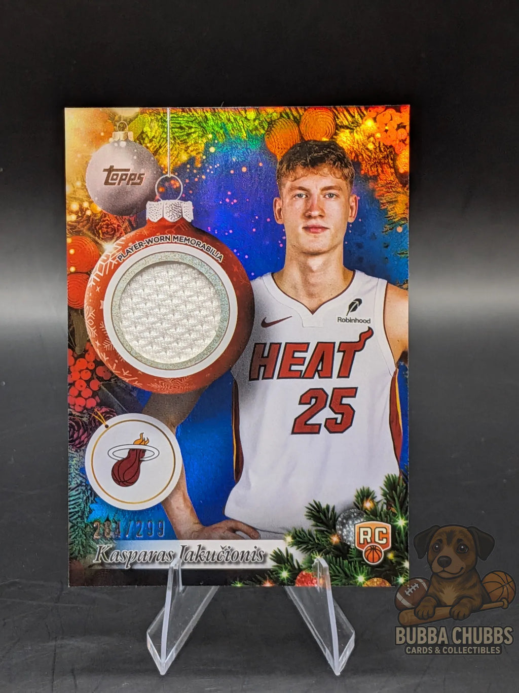 Basketball trading card of rookie Kasparas Jakučionis of the Miami Heat topps holiday relic jersey 284/299