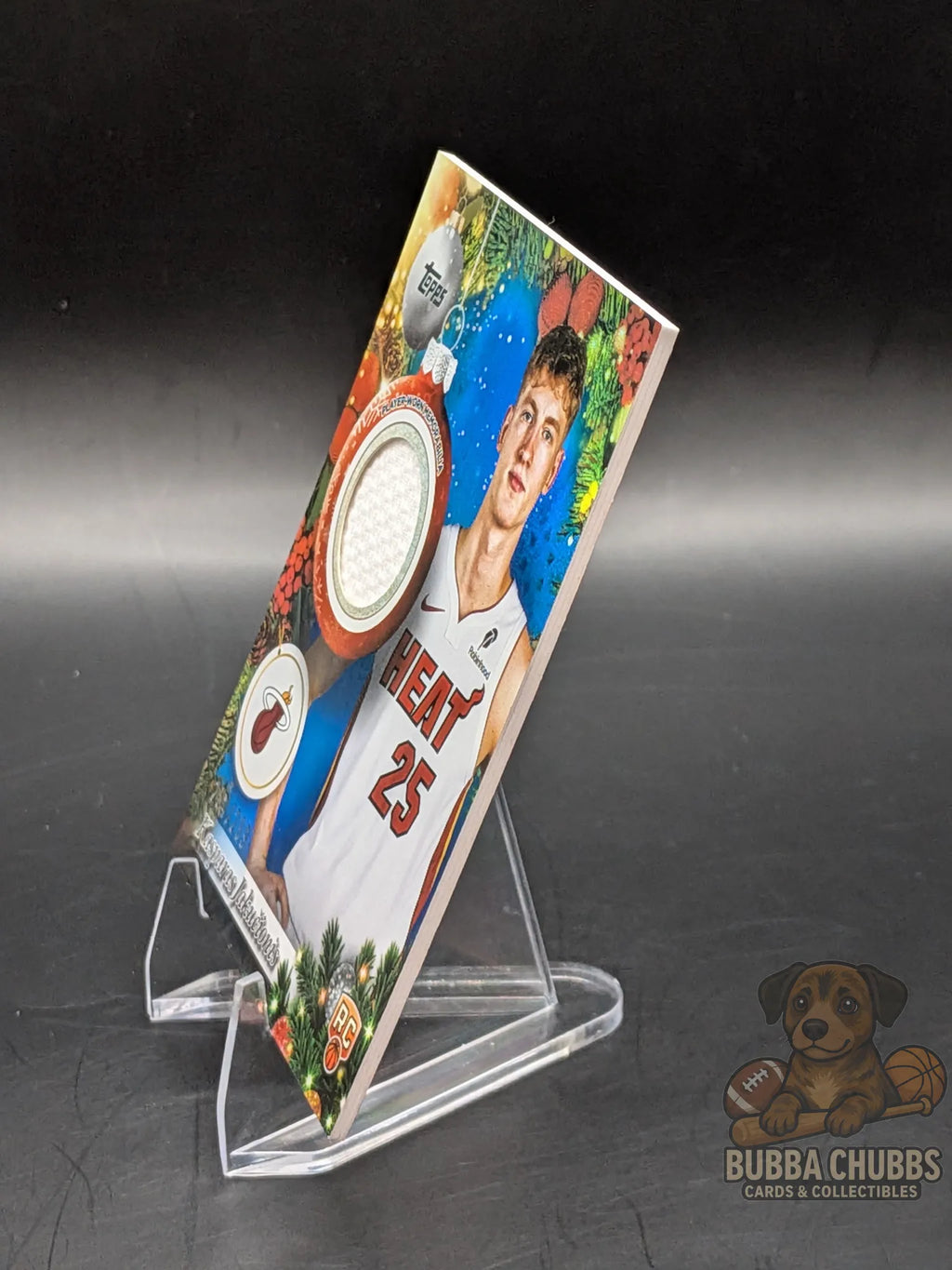 Basketball trading card of rookie Kasparas Jakučionis of the Miami Heat topps holiday relic jersey 284/299