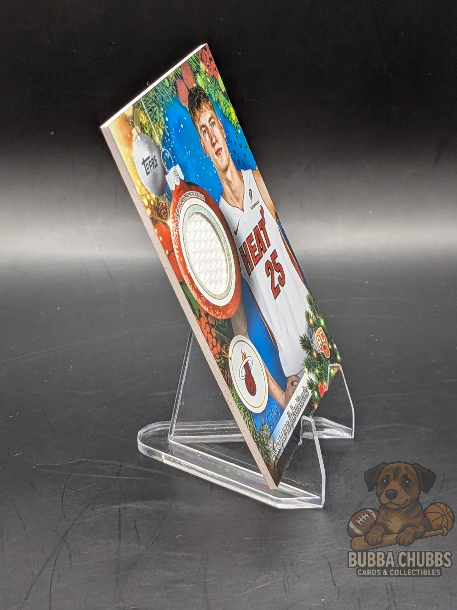 Basketball trading card of rookie Kasparas Jakučionis of the Miami Heat topps holiday relic jersey 284/299