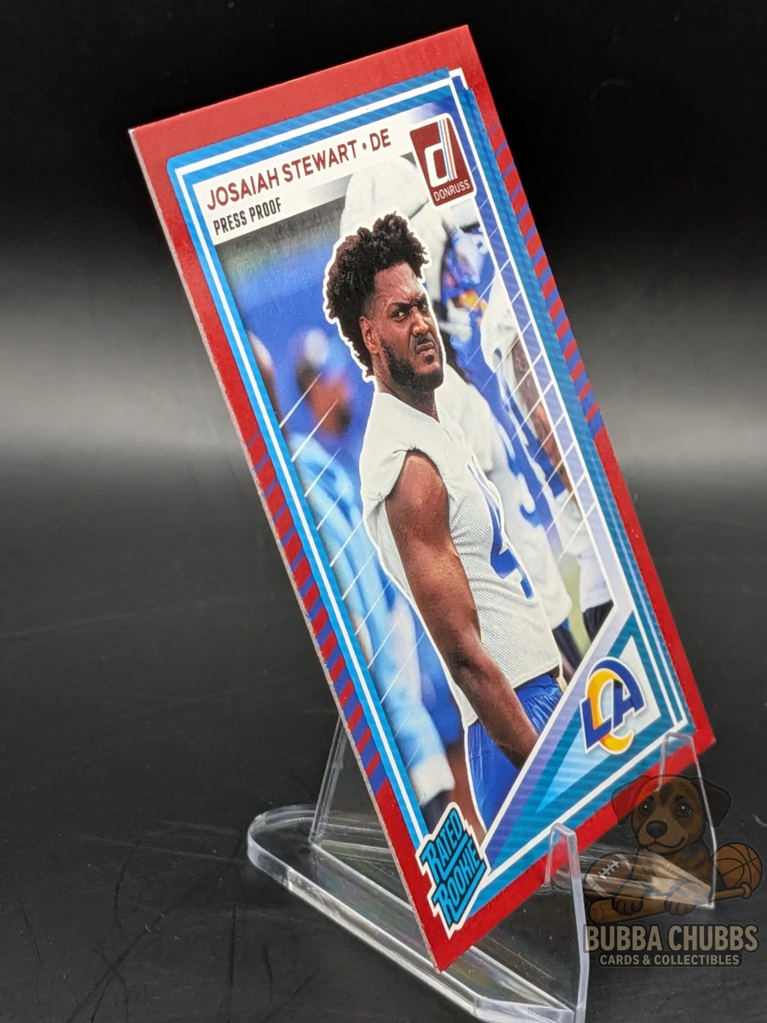 Football trading card of Josiah Stewart of the LA Chargers donruss rated rookie press proof