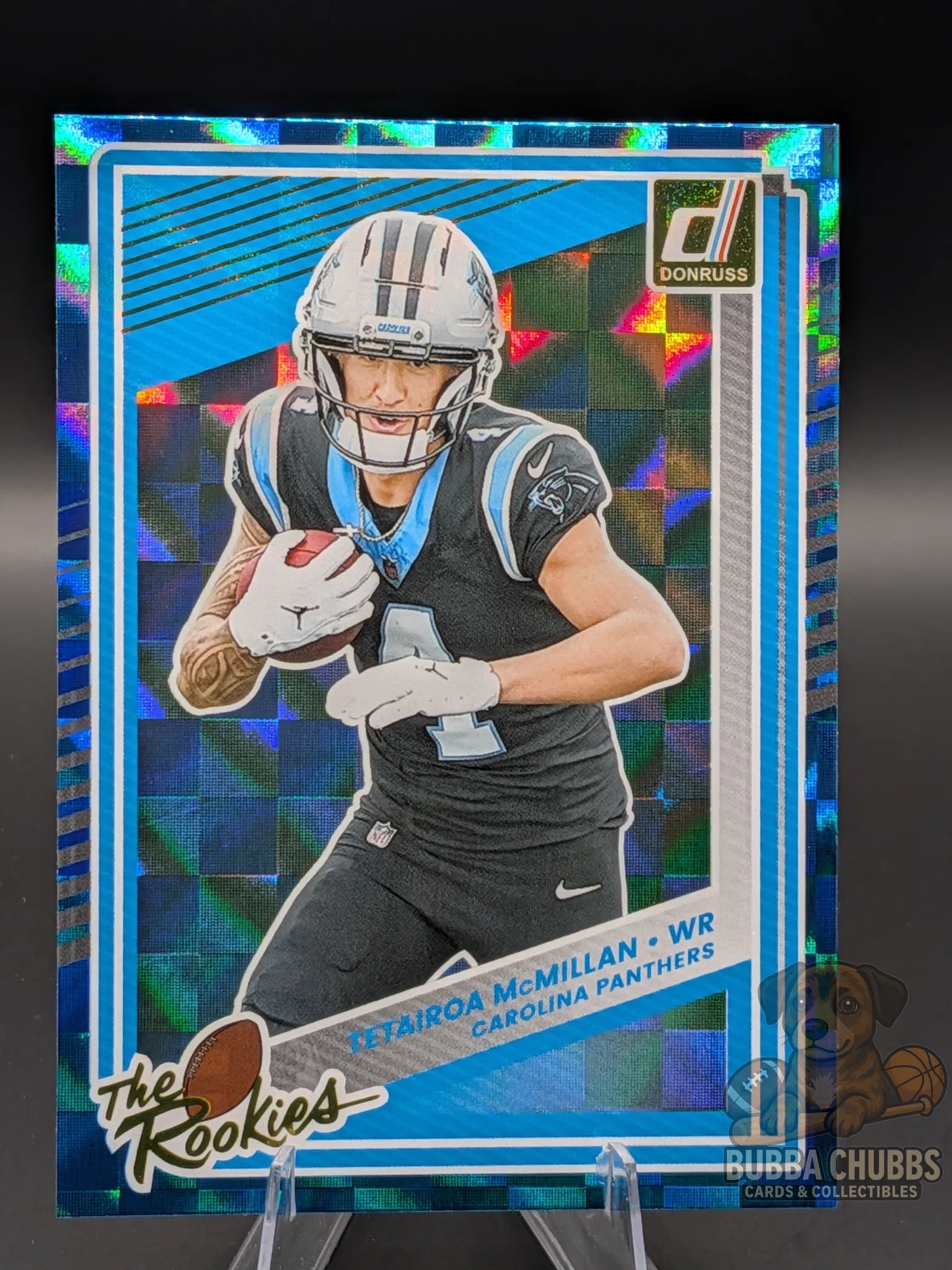 Football trading card of Tetairoa McMillan of the Carolina Panthers panini donruss the rookies blue foil holographic checkerboard parallel