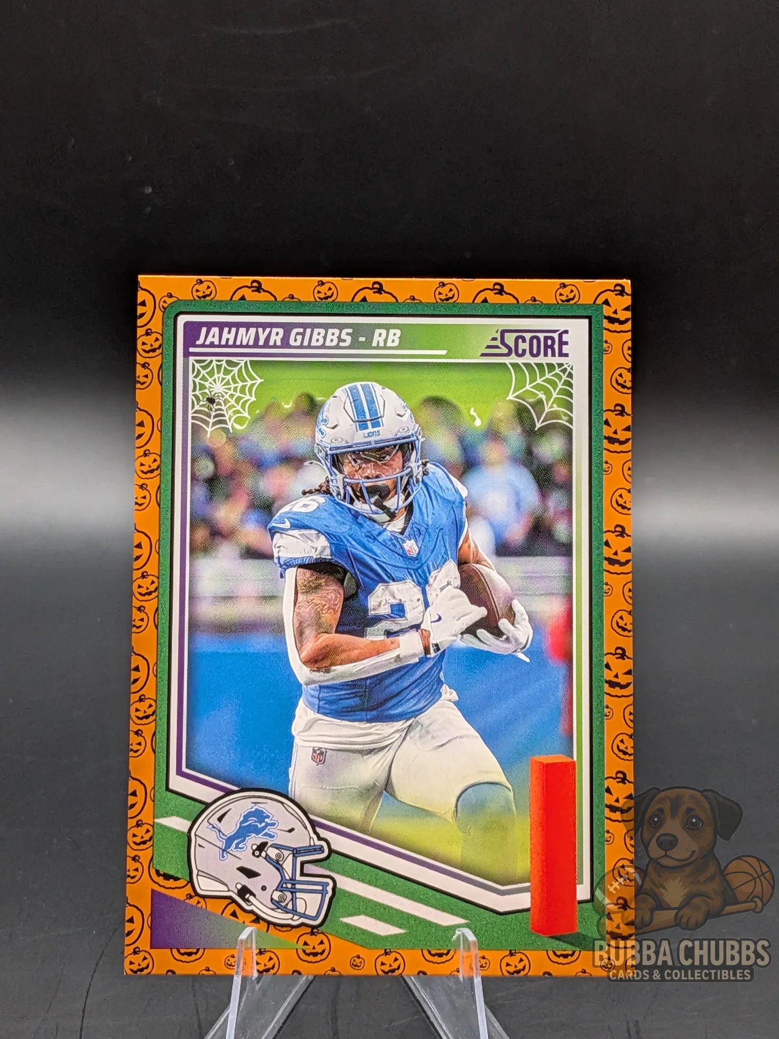 Football trading card of Jahmyr Gibbs of the Detroit Lyons panini score-a-treat halloween parallel
