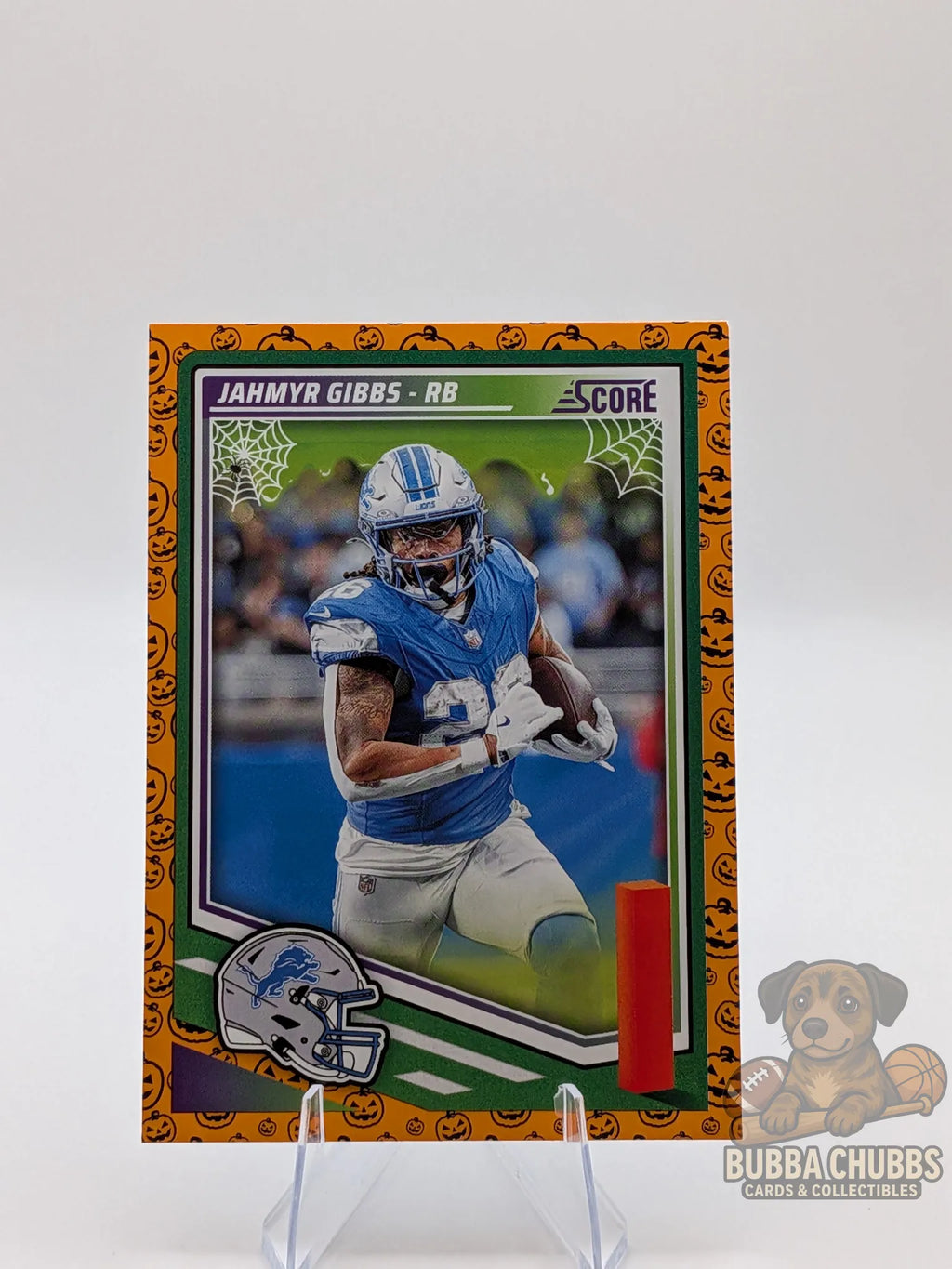 Football trading card of Jahmyr Gibbs of the Detroit Lyons panini score-a-treat halloween parallel