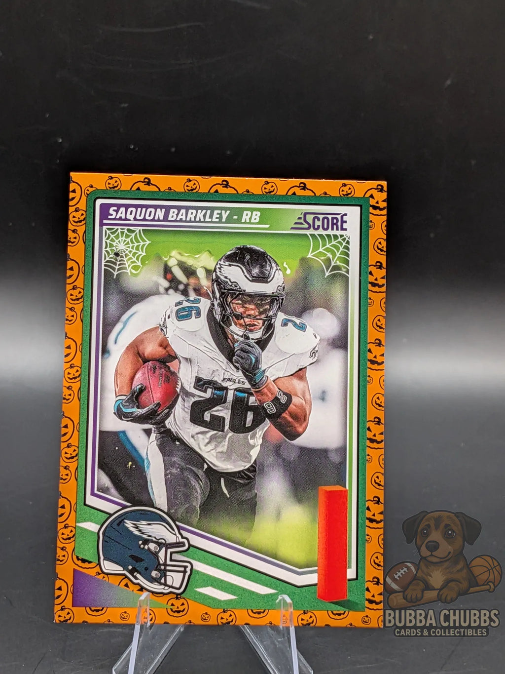 Football trading card with Saquon Barkley of the Philadelphia Eagles panini score-a-treat halloween parallel