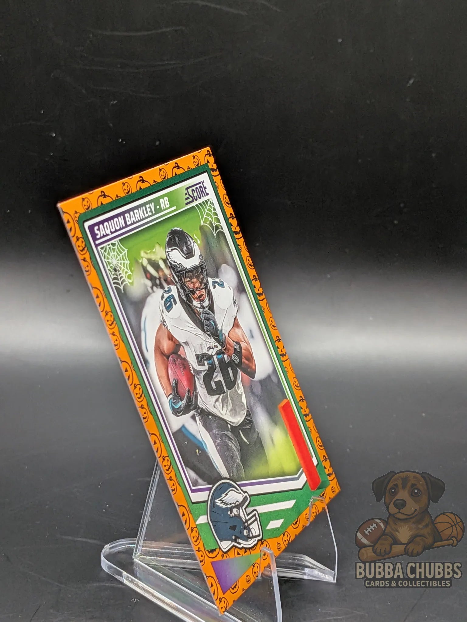 Football trading card with Saquon Barkley of the Philadelphia Eagles panini score-a-treat halloween parallel