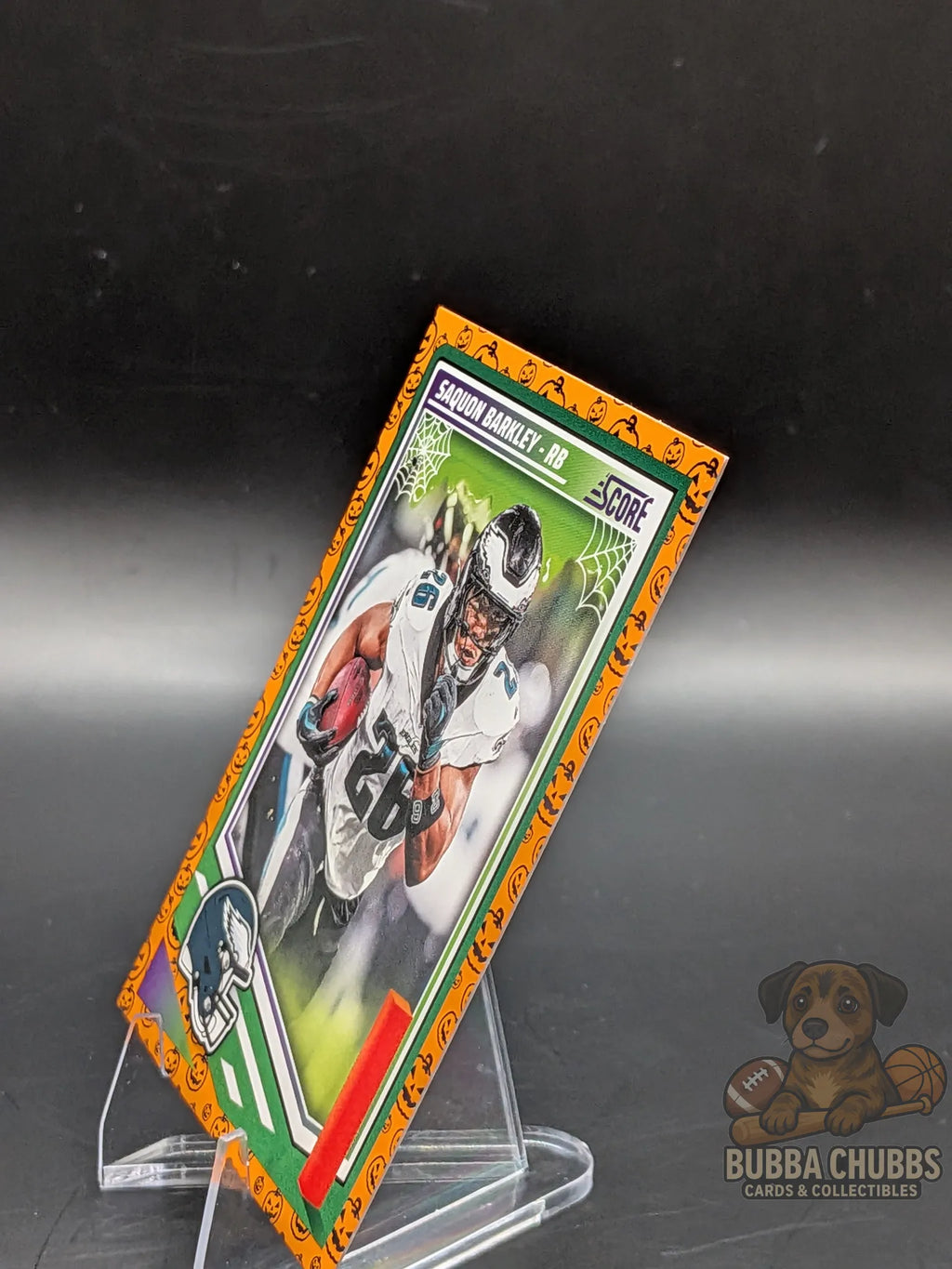 Football trading card with Saquon Barkley of the Philadelphia Eagles panini score-a-treat halloween parallel