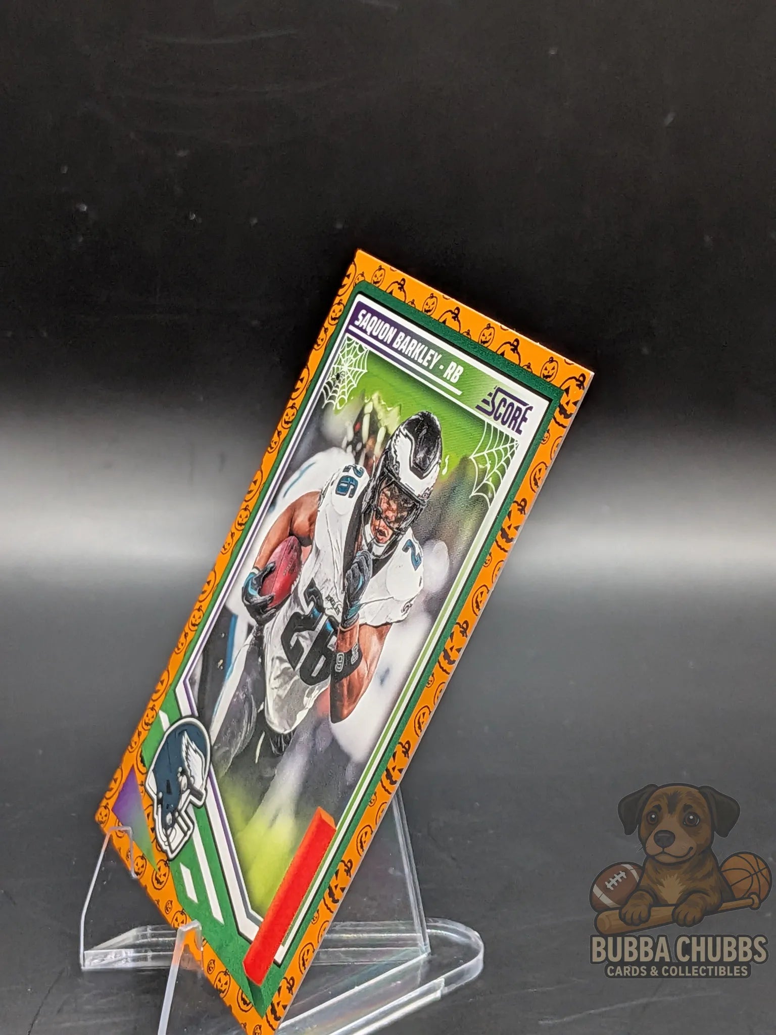 Football trading card with Saquon Barkley of the Philadelphia Eagles panini score-a-treat halloween parallel