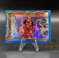 Basketball trading card of Darius Garland Cleveland cavaliers topps holiday blue glitter parallel