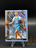 Basketball trading card of a player Ryan Kalkbrenner of the Charlotte Hornets topps holiday silver glitter parallel