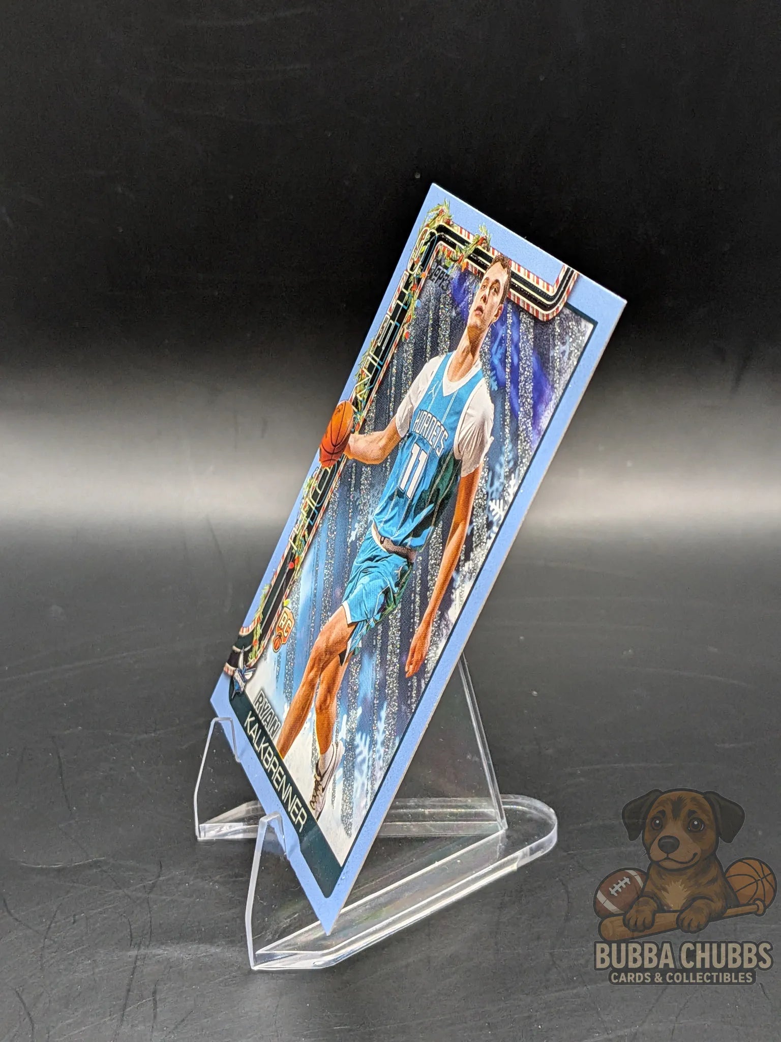 Basketball trading card of a player Ryan Kalkbrenner of the Charlotte Hornets topps holiday silver glitter parallel
