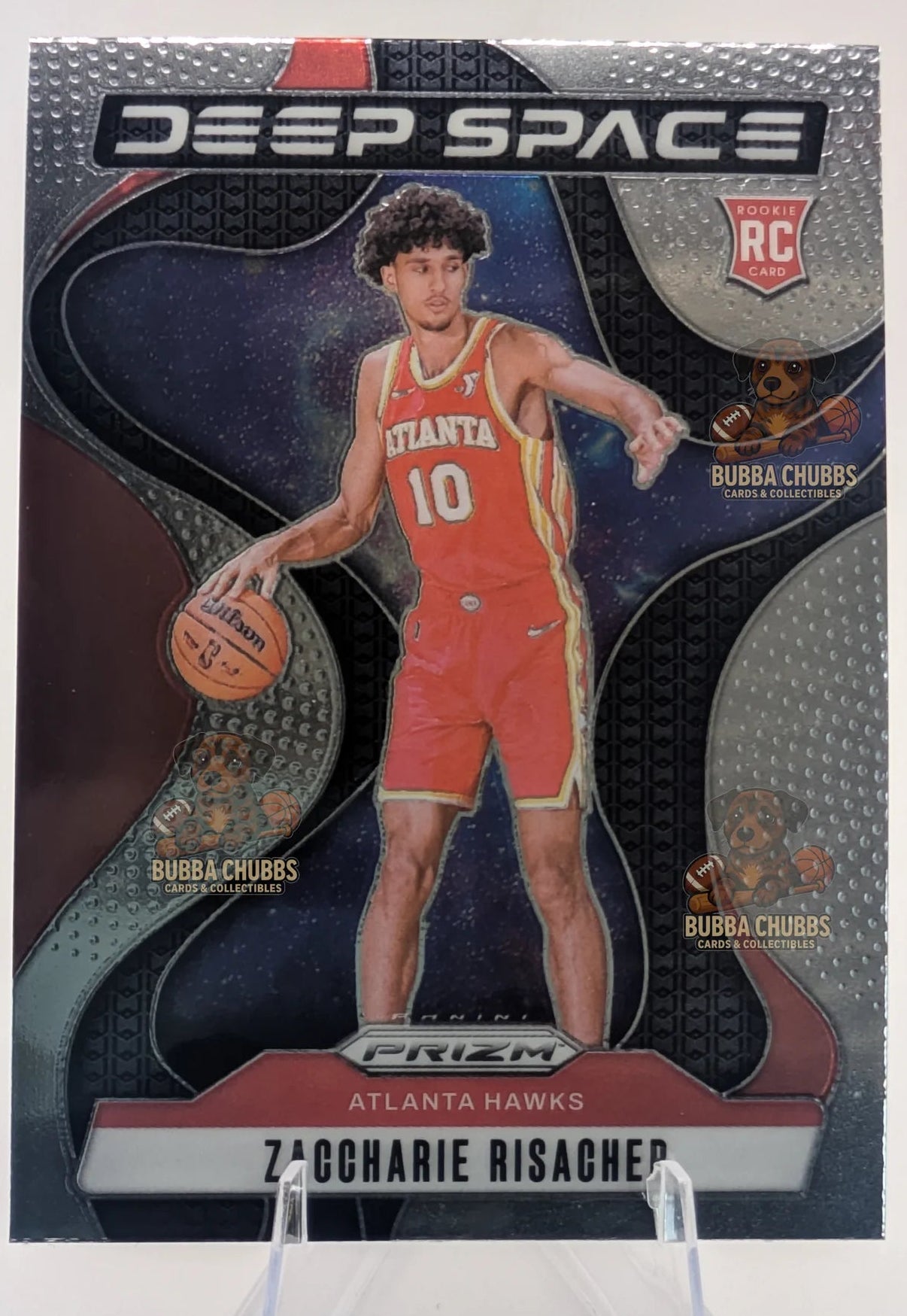 Basketball trading card of Zaccharie Risacher in an Atlanta Hawks jersey with 'Deep Space' branding.