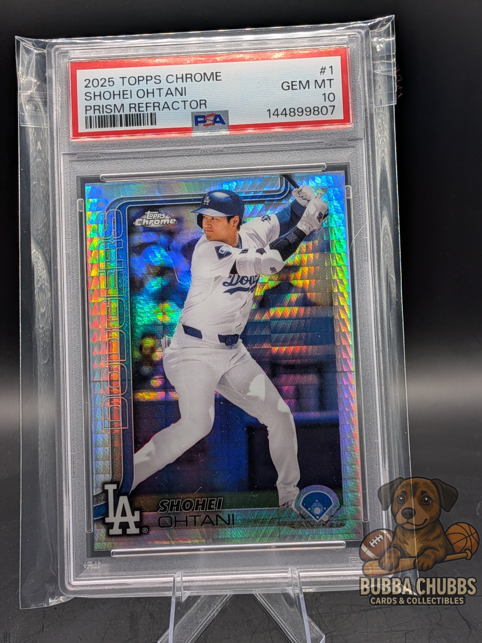 Shohei Ohtani sports trading card of Shohei Ohtani topps chrome prism refractor in protective packaging with a grading label.