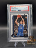 Basketball trading card of Cooper Flagg of the Dallas Mavericks rookie topps psa graded 10